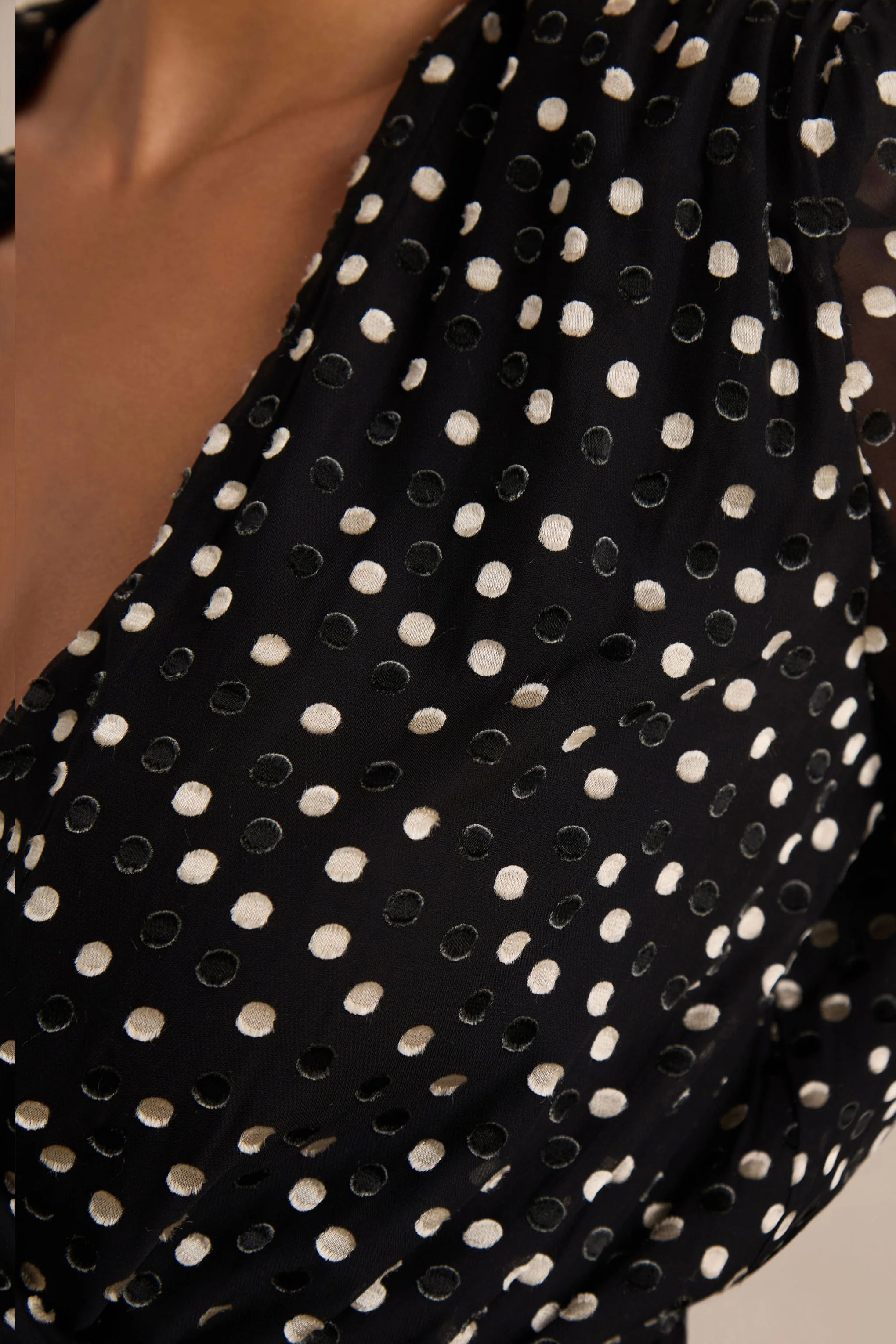 Mela | Black And White Polka Dot Plunge-Neck Mini Dress With Bell-Sleeves And Sash Detail - Image 6