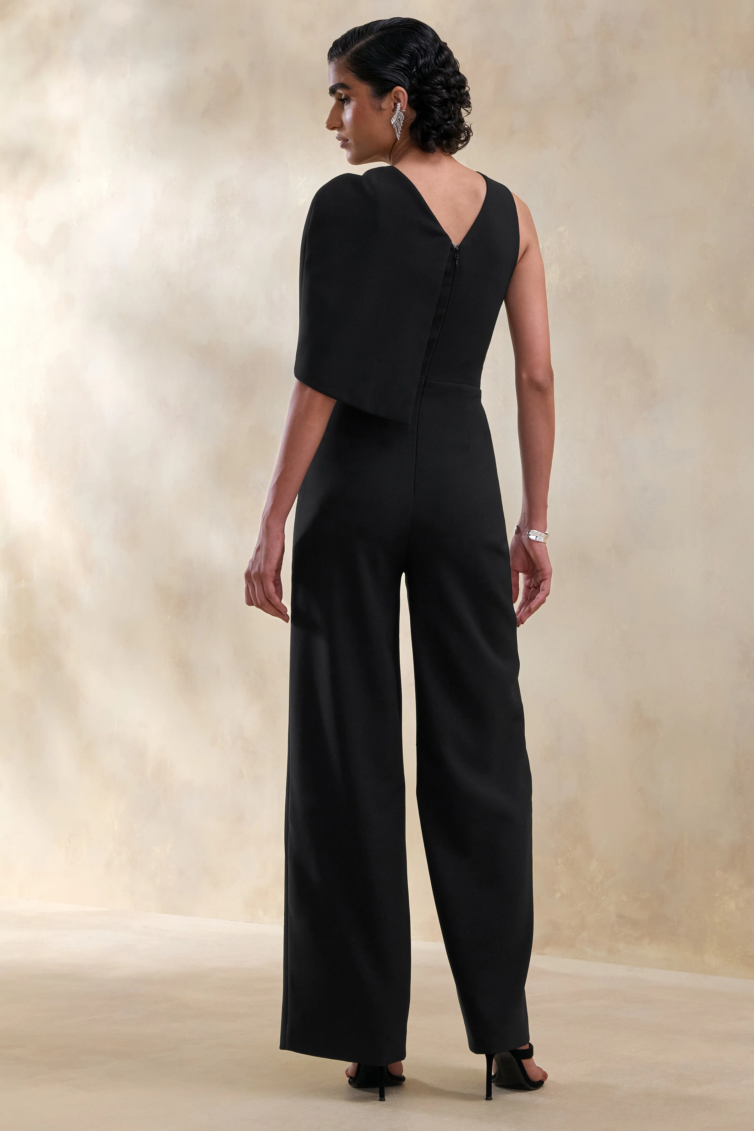 Quinley | Black Asymmetric-Neck Jumpsuit With Cape-Sleeve - Image 2