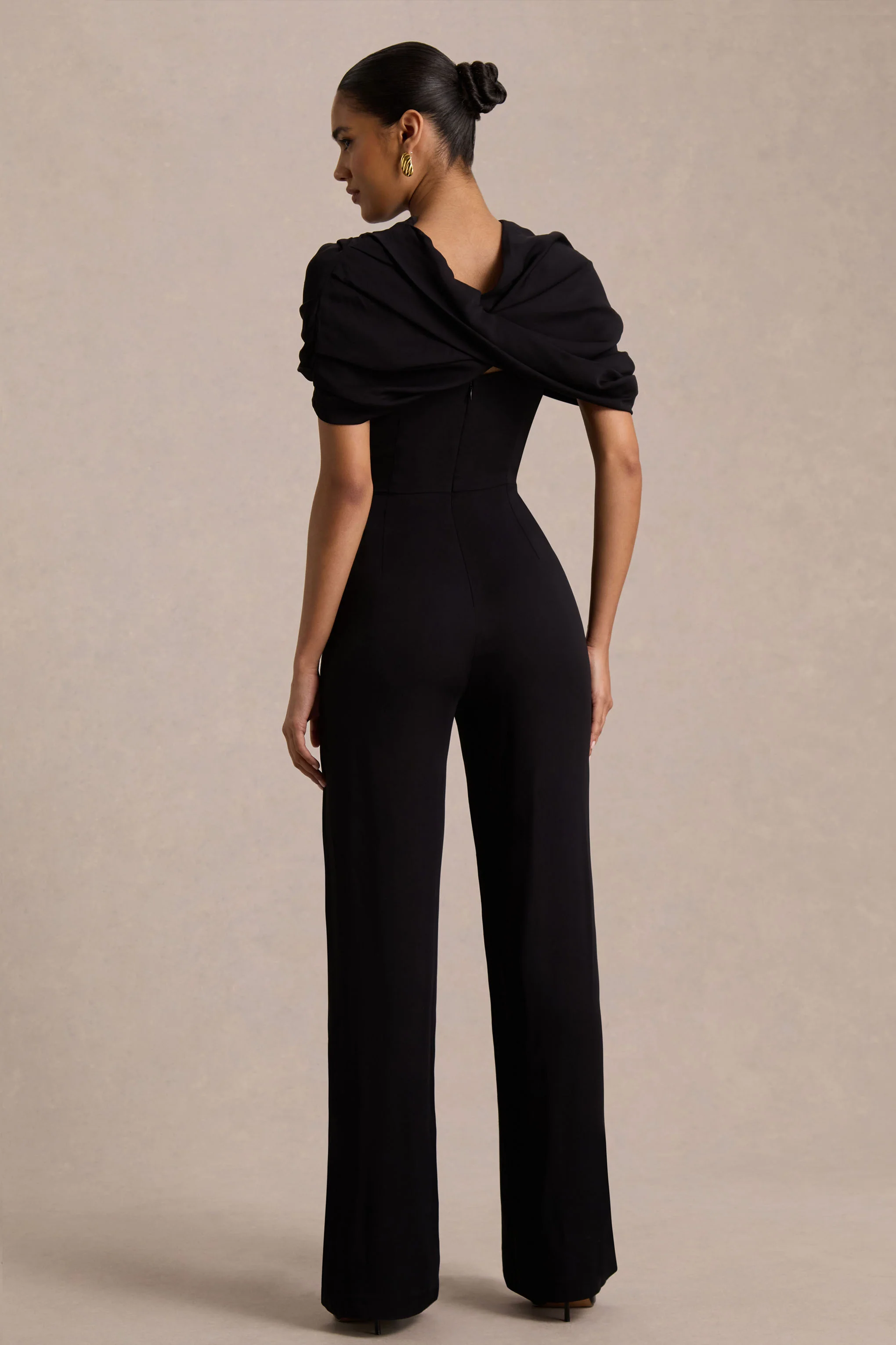 Raquel | Black Asymmetric-Neck Jumpsuit With Twisted Cape Detail - Image 2