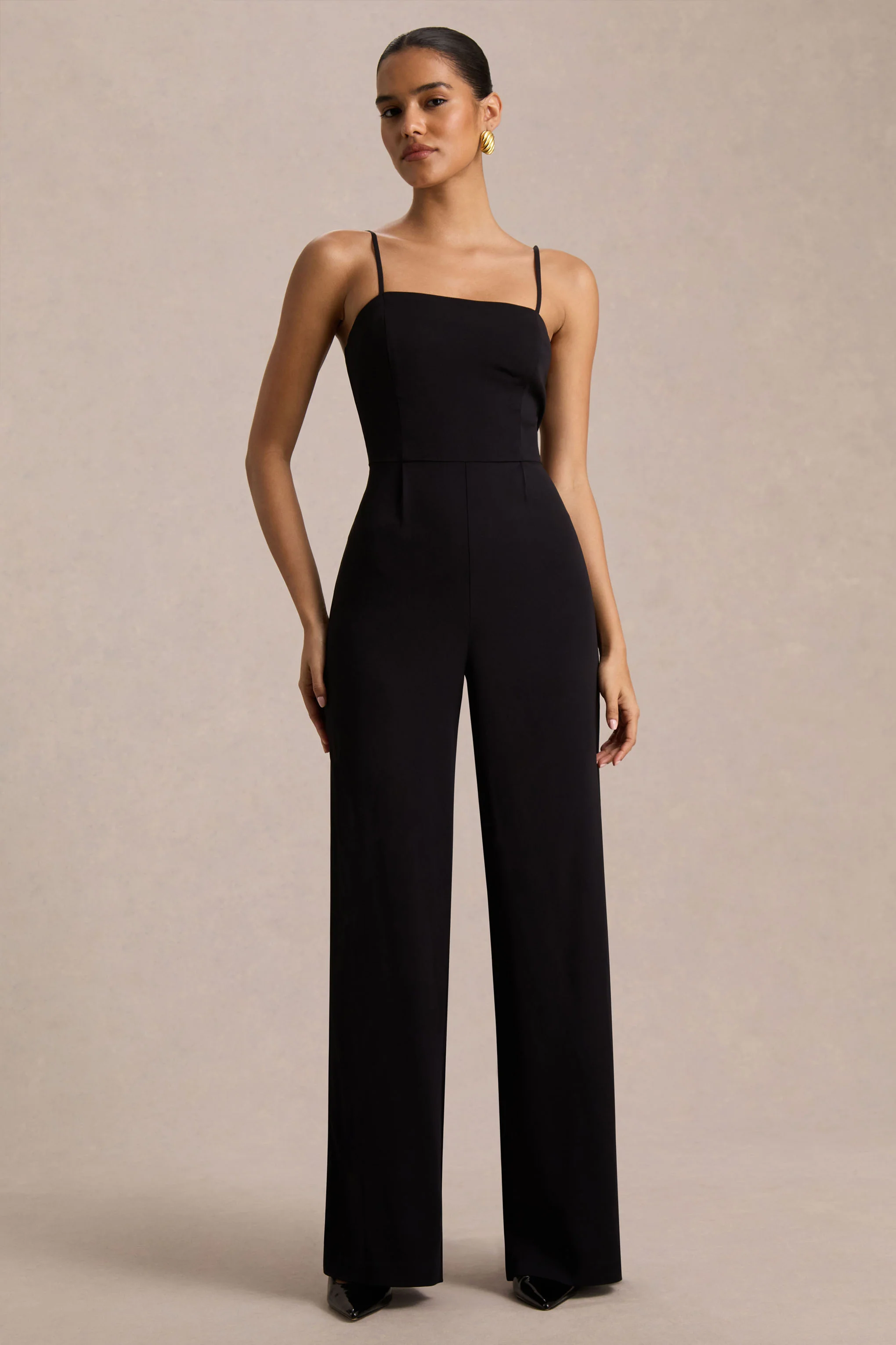 Raquel | Black Asymmetric-Neck Jumpsuit With Twisted Cape Detail - Image 3
